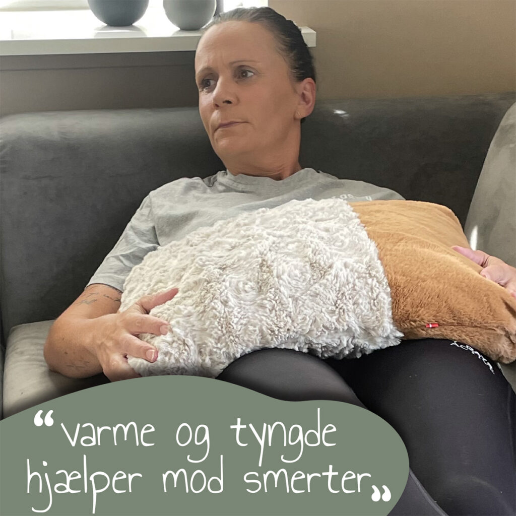 varme og tyngde fra en Floofer hjælper med smerter